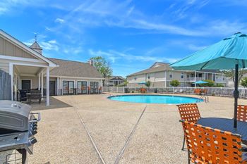 our apartments have a resort style pool and patioat The Pointe Apartment Homes, Gautier, MS, 39553